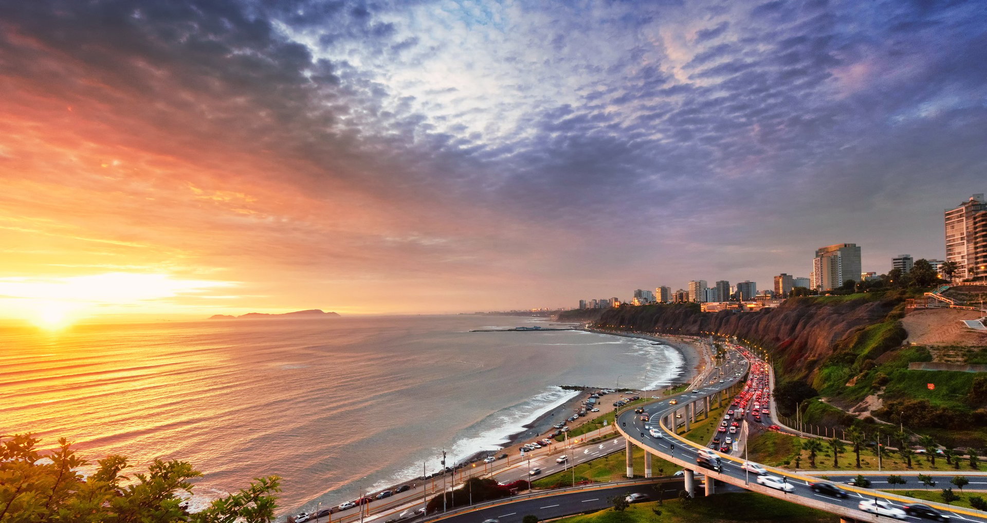 Lima, Peru along the coast also known as Circuito de Playas de la Costa Verde at a golden hour sunset
